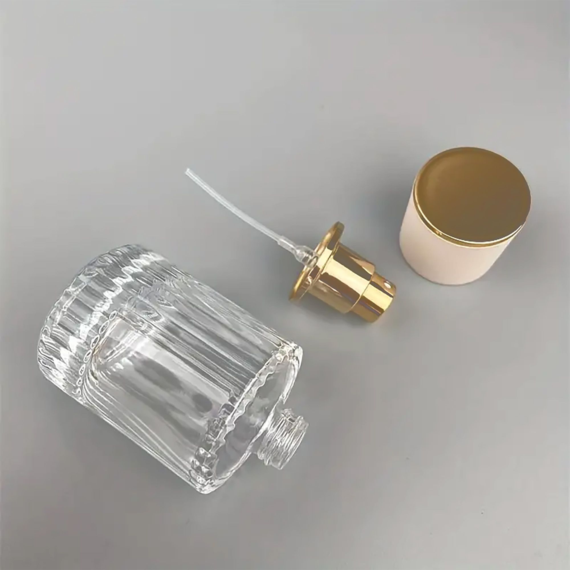 Frascos de vidrio para perfume con pulveridaor y tapa rosa 30 ml